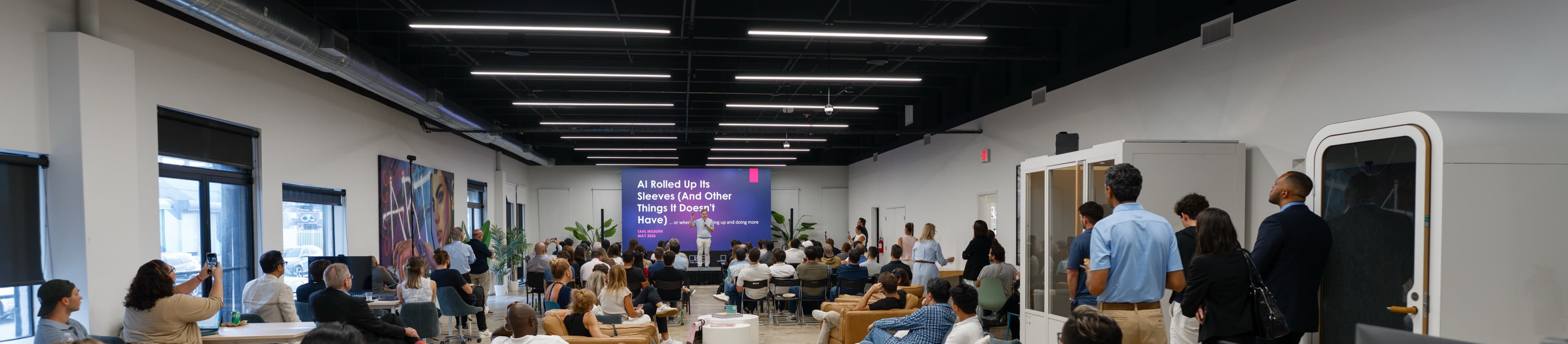 A full house at Generative Gathering, The LAB Miami — the crowd facing the stage, May 2026