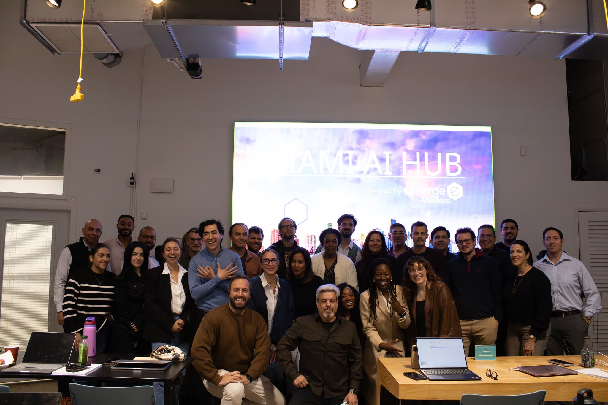 A Miami AI School cohort gathered after an in-person session